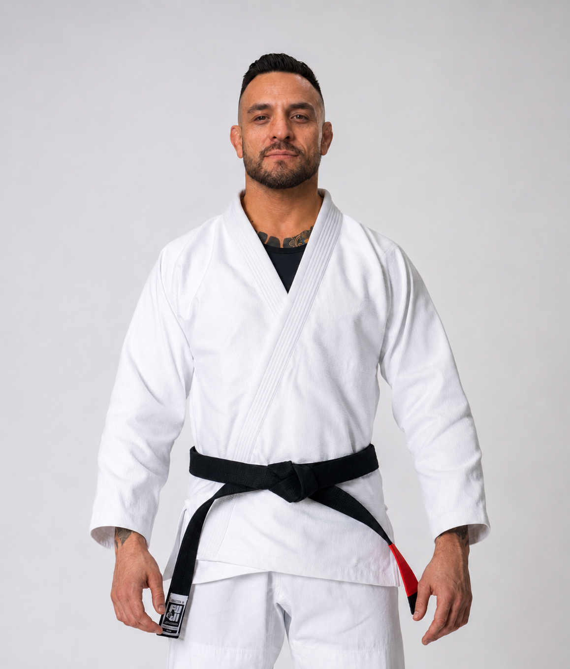 Professor Miguel Samperio in a white Brazilian Jiu-Jitsu gi